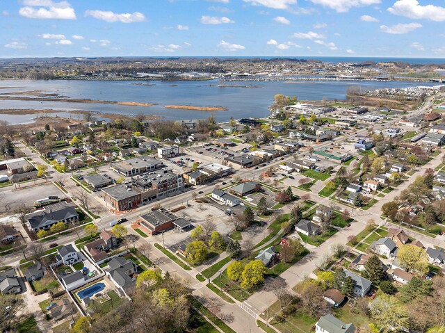 bird's eye view with a residential view and a water view