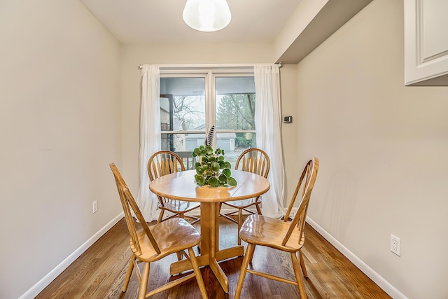 2204 Rivenoak Ct, Ann Arbor, MI 48103 - dining space featuring baseboards and light wood finished floors