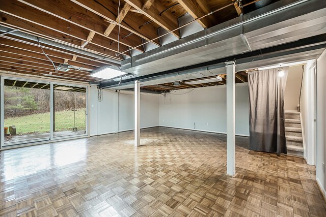 2204 Rivenoak Ct, Ann Arbor, MI 48103 - basement with baseboards and stairs