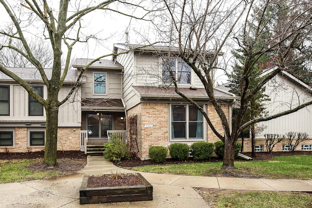 2204 Rivenoak Ct, Ann Arbor, MI 48103 - view of front of property featuring brick siding and a shingled roof