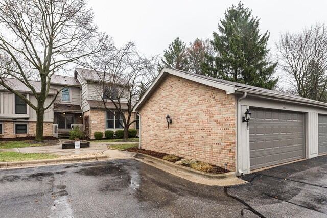 2204 Rivenoak Ct, Ann Arbor, MI 48103 - view of home's exterior featuring brick siding