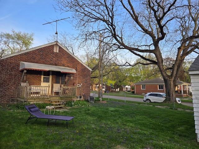 exterior space featuring a deck and central AC