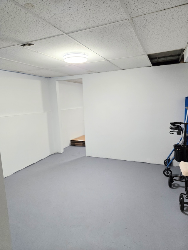finished basement with a drop ceiling