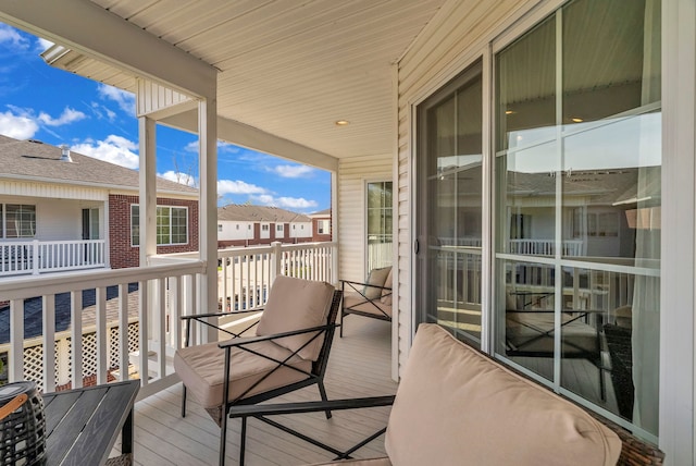 balcony featuring a residential view