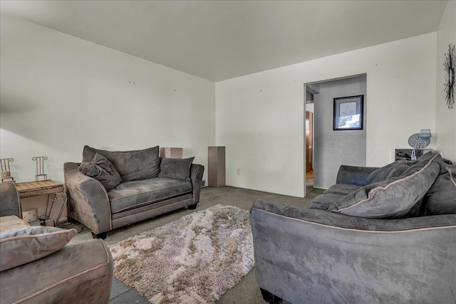 living area featuring carpet