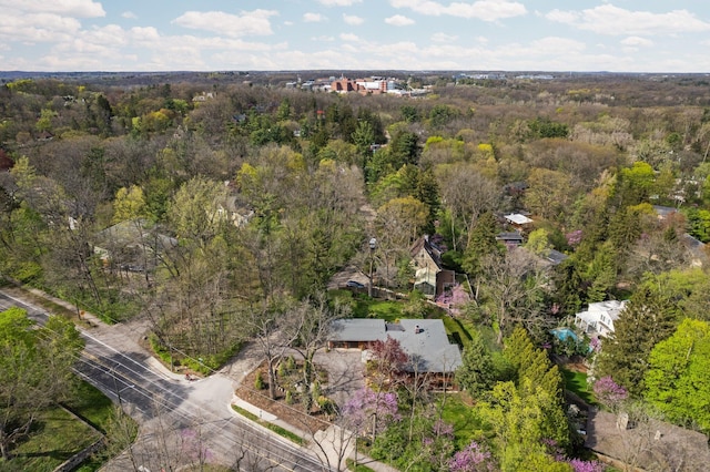 bird's eye view featuring a view of trees