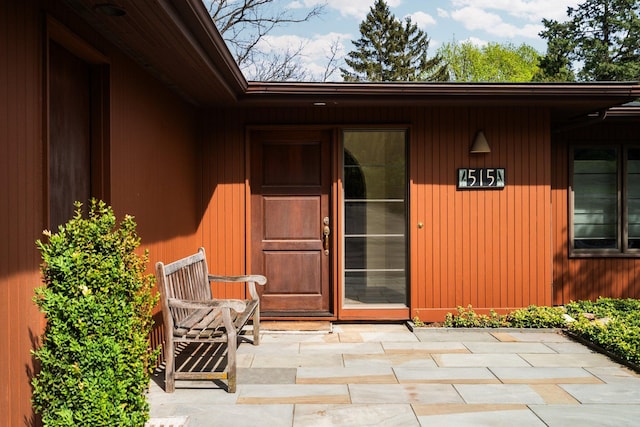 doorway to property featuring a patio