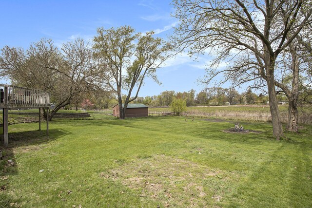 view of yard featuring a deck