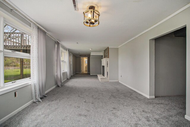 hallway with light colored carpet and baseboards