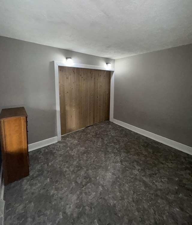 307 N Court St, Stanton, MI 48888 - unfurnished bedroom featuring baseboards