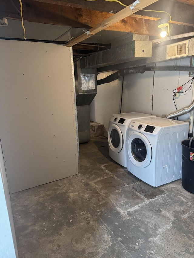 307 N Court St, Stanton, MI 48888 - washroom with separate washer and dryer, laundry area, and visible vents