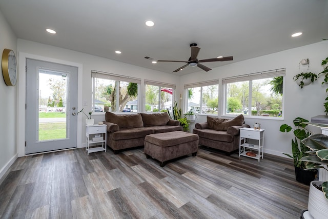 living area with a ceiling fan, baseboards, recessed lighting, and wood finished floors