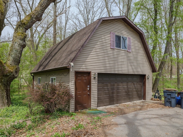 exterior space with a garage