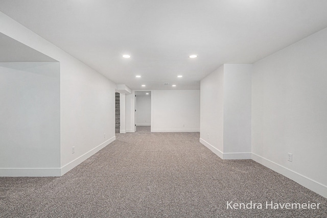 finished basement featuring recessed lighting, carpet, and baseboards