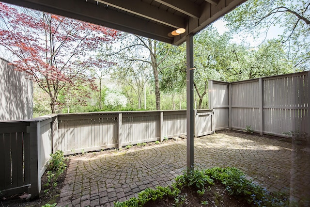 view of patio with a fenced backyard
