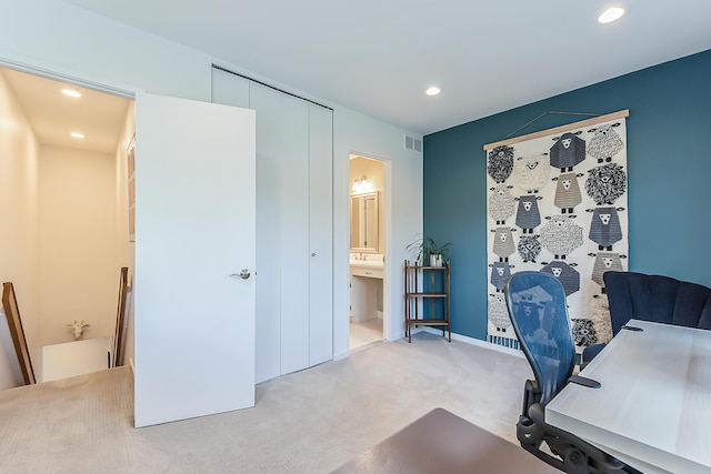 carpeted office space featuring recessed lighting and visible vents