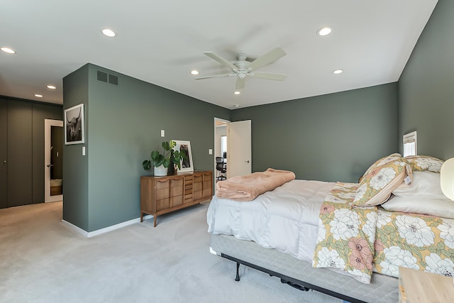 bedroom featuring recessed lighting, visible vents, and light carpet