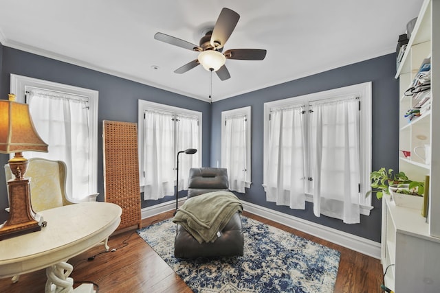 206 S Webster St, Jackson, MI 49203 - living area with baseboards, a ceiling fan, crown molding, and wood finished floors