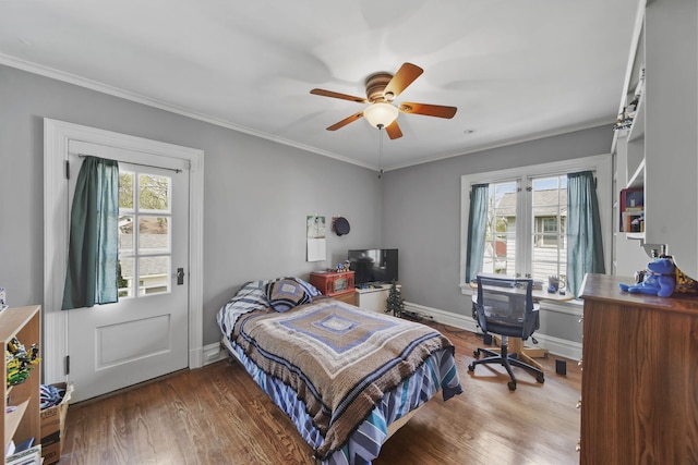 206 S Webster St, Jackson, MI 49203 - bedroom with ornamental molding and wood finished floors