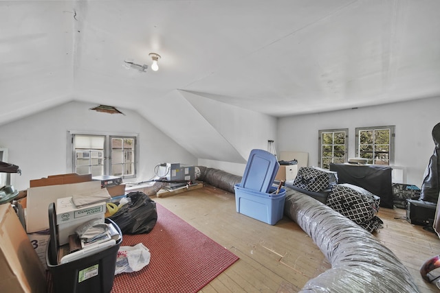 206 S Webster St, Jackson, MI 49203 - interior space with lofted ceiling and hardwood / wood-style flooring