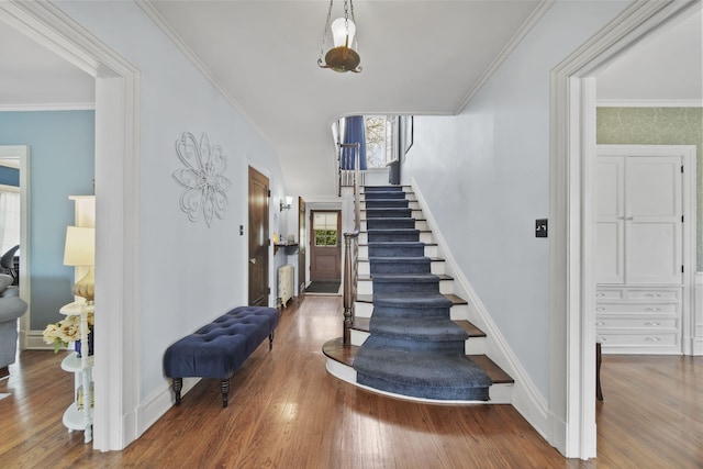 206 S Webster St, Jackson, MI 49203 - stairs with baseboards, ornamental molding, and wood finished floors