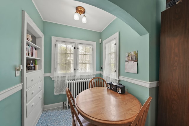 206 S Webster St, Jackson, MI 49203 - dining room with radiator, ornamental molding, and baseboards