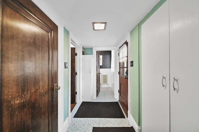 206 S Webster St, Jackson, MI 49203 - corridor featuring baseboards and visible vents