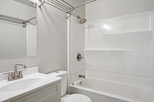 full bath featuring shower / bath combination, toilet, and vanity