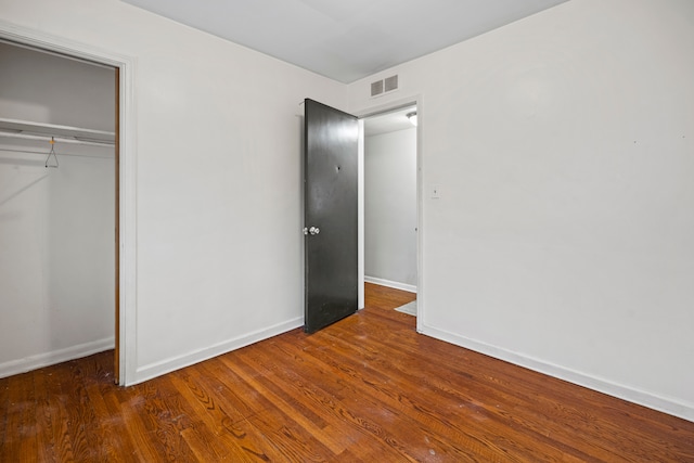 19157 Macarthur, Redford, MI 48240 - unfurnished bedroom featuring a closet, wood finished floors, and baseboards