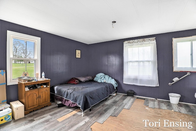 bedroom featuring wood finished floors