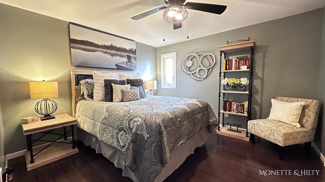 bedroom featuring baseboards, ceiling fan, and hardwood / wood-style floors