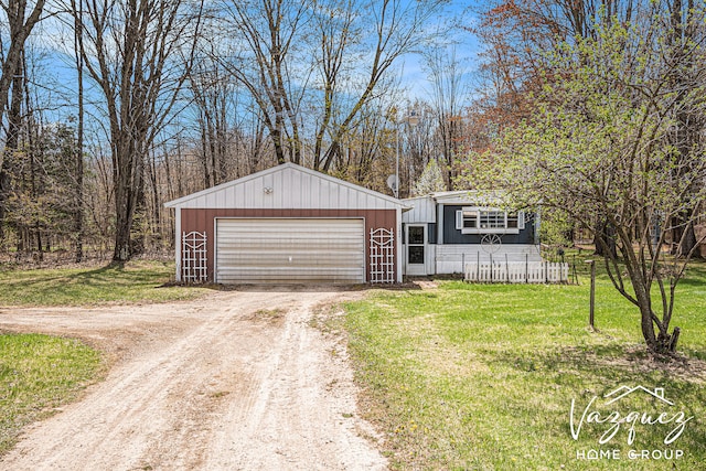 12480 Fargo St NE, Gowen, MI 49326 - detached garage featuring dirt driveway