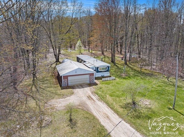12480 Fargo St NE, Gowen, MI 49326 - drone / aerial view featuring a wooded view