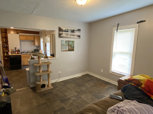 living room with visible vents and baseboards