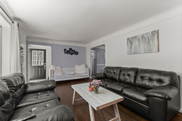 1111 N Franklin St, Dearborn, MI 48128 - living area featuring arched walkways and dark wood-style flooring