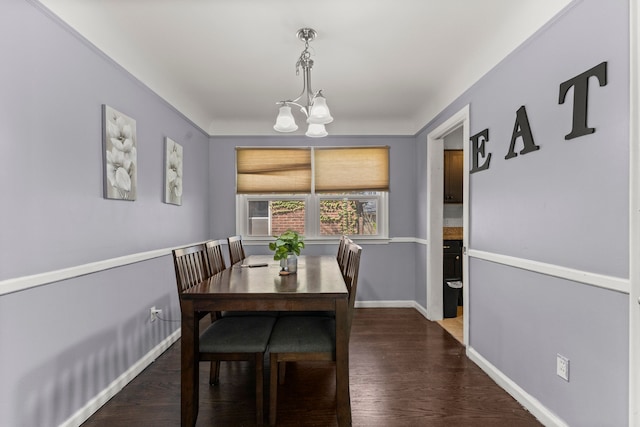 1111 N Franklin St, Dearborn, MI 48128 - dining room with baseboards, dark wood finished floors, and a notable chandelier