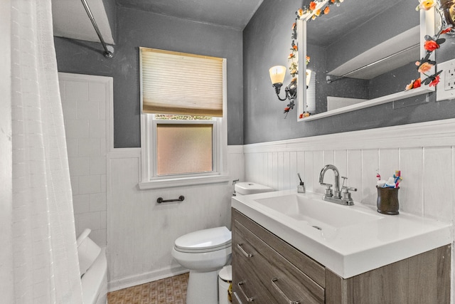 1111 N Franklin St, Dearborn, MI 48128 - bathroom featuring vanity, toilet, and a wainscoted wall