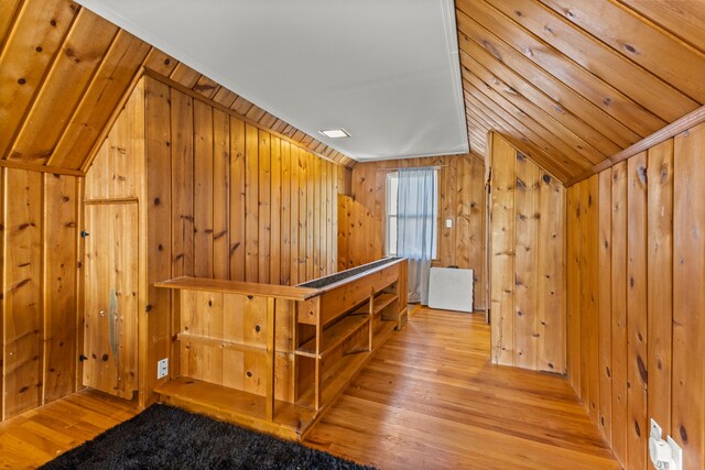 1111 N Franklin St, Dearborn, MI 48128 - additional living space with wood finished floors, wooden walls, and vaulted ceiling