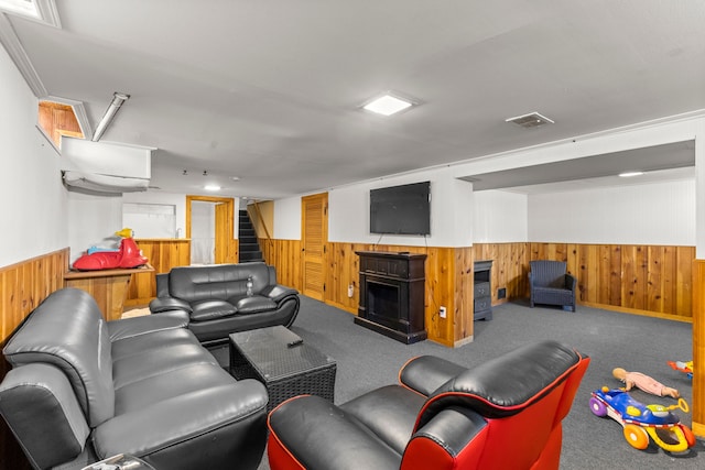 1111 N Franklin St, Dearborn, MI 48128 - living area with wooden walls, visible vents, wainscoting, and carpet