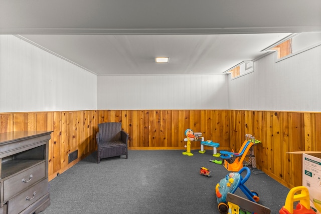 1111 N Franklin St, Dearborn, MI 48128 - rec room with visible vents, carpet flooring, wainscoting, and wooden walls