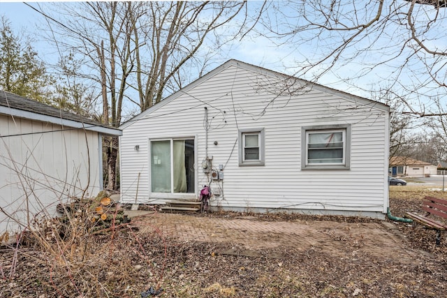 back of property with entry steps