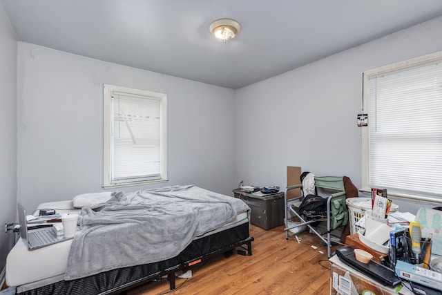 bedroom featuring light wood finished floors