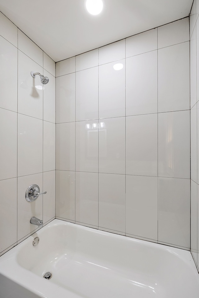 full bath featuring shower / tub combination