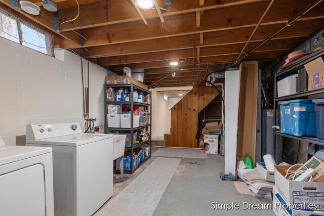 below grade area featuring washer and dryer