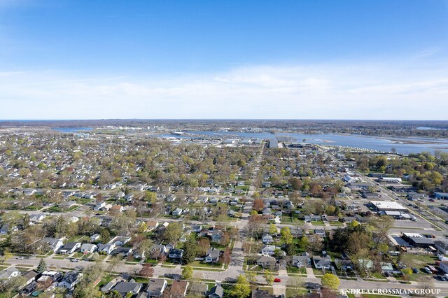 birds eye view of property featuring a water view and a residential view