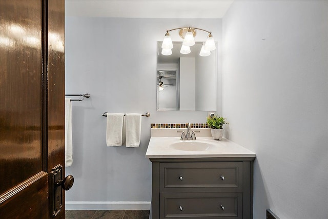 bathroom featuring vanity and ceiling fan