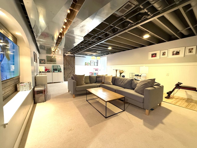 living room featuring carpet flooring and visible vents