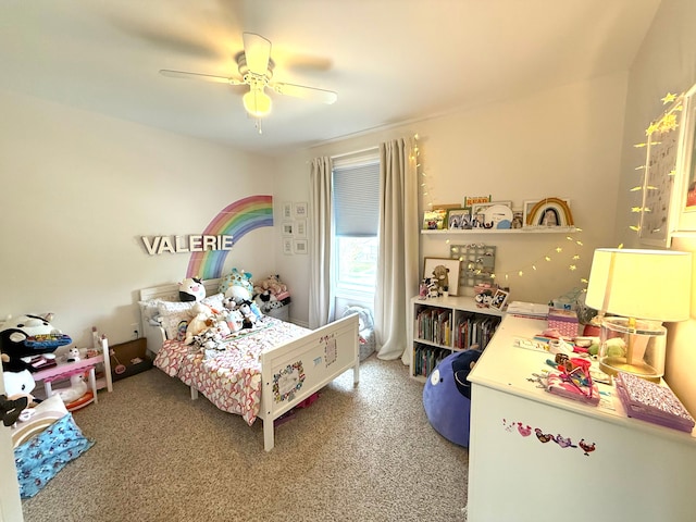 bedroom with a ceiling fan and light colored carpet