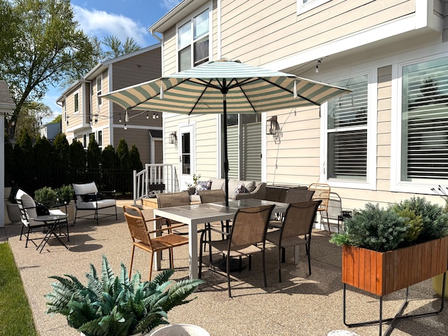 view of patio / terrace with fence and outdoor dining space