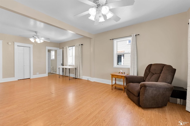 934 Smith St, Monroe, MI 48161 - sitting room featuring baseboards, ceiling fan, and light wood-type flooring